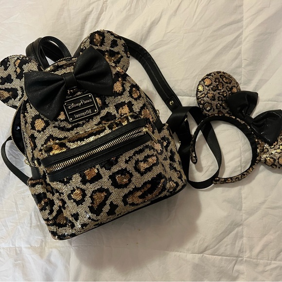 Loungefly Handbags - Cheetah print Loungefly backpack and official Disney parks Minnie ears